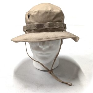 a mannequin wearing a khaki tan military boonie cover