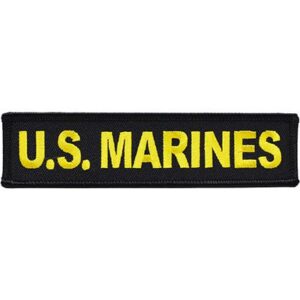 a black and yellow US Marines tab patch