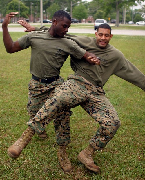 two Marine Corps members practicing MCMAP