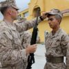 Marine officer checking the utility cover of a recruit