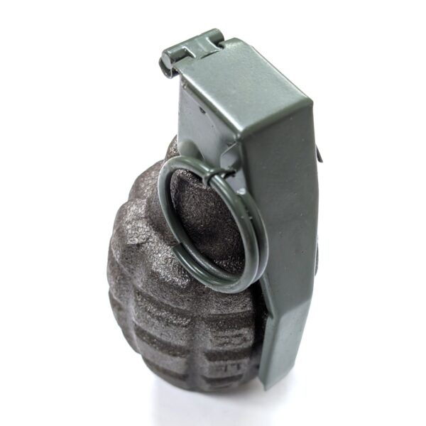 a dummy pineapple grenade with a green striker lever