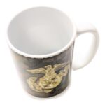 top view of a US Marine Corps coffee mug with Woodland MARPAT camouflage and a gold Eagle, Globe, & Anchor (EGA) emblem