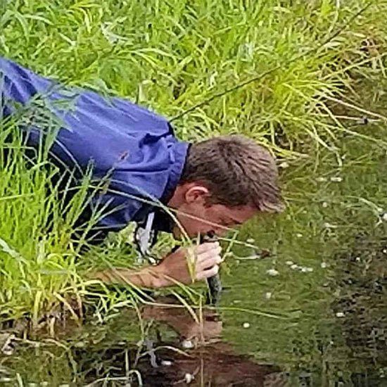 Life Straw drinking from unclean water