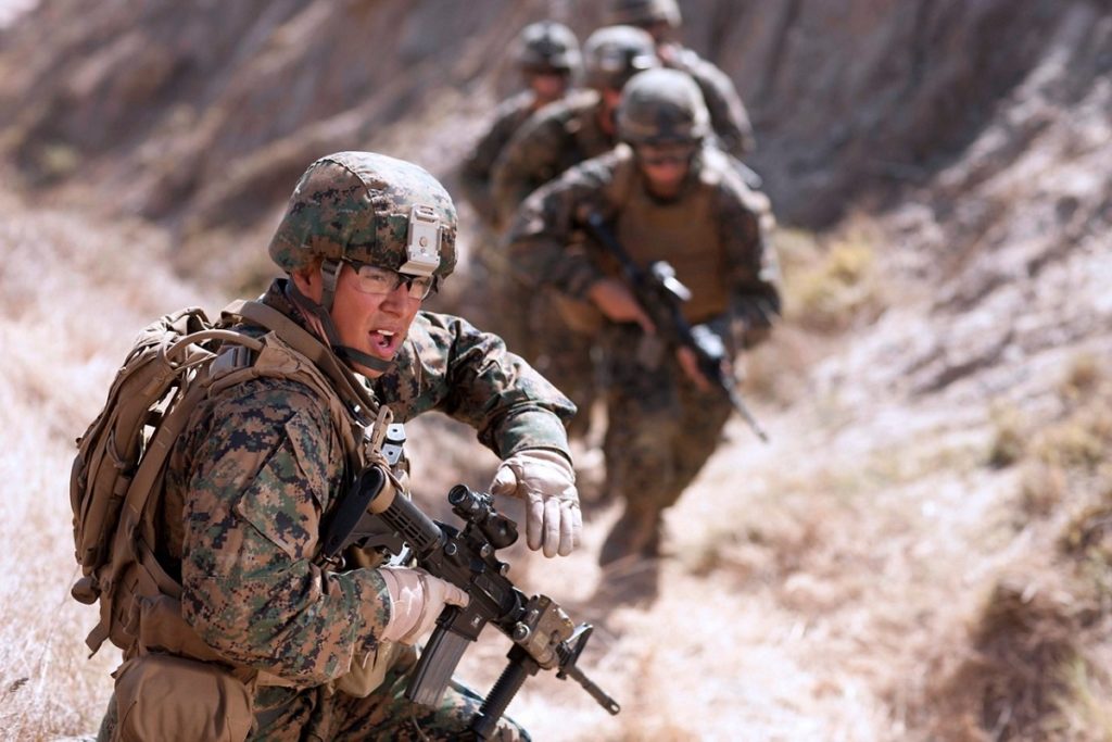 USMC Officer Leading Marines in Combat