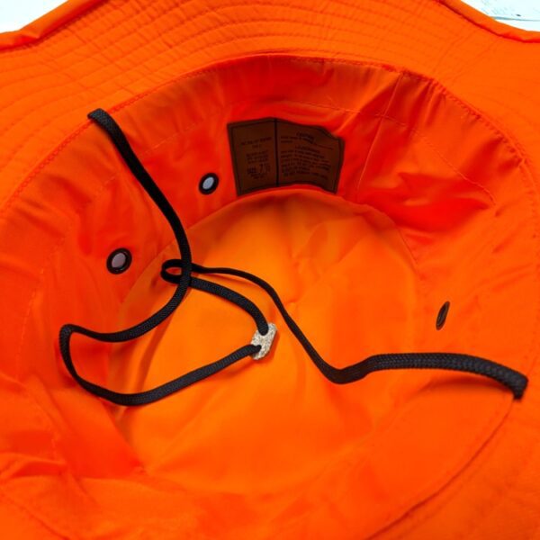 the inside of a waterproof bright orange boonie hat for hunting and outdoor