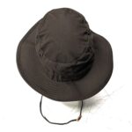 the top of a dark brown military spec jungle hat