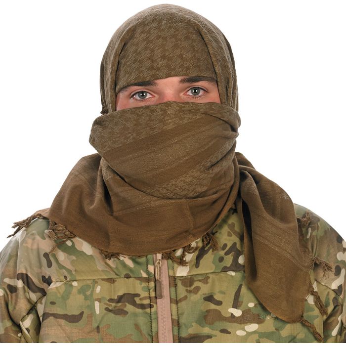 an Army soldier wearing a coyote brown tactical shemagh