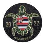 a matte black challenge coin with a colorful sea turtle "Pearl Harbor, HI"