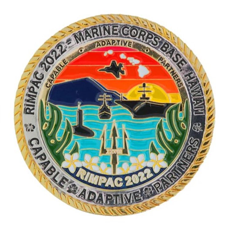 a colorful challenge coin with a colorful maritime warfare exercise and the words "RIMPAC," "Marine Corps Base Hawaii," and "Capable, Adaptive, Partners."