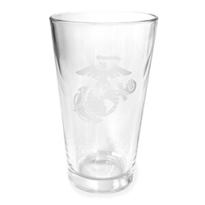 a clear Marine Corps pint glass with an EGA