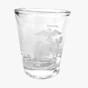 a clear US Marine Corps shot glass with the Eagle, Globe, and Anchor logo