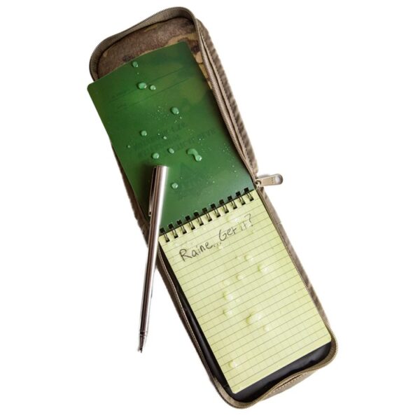 a wet waterproof notebook inside a walking wallet with a pen