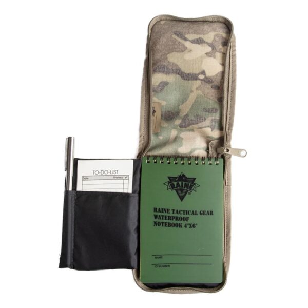 the inside of a camo walking wallet with a waterproof notebook and a compartment for pens, credit cards, and cash