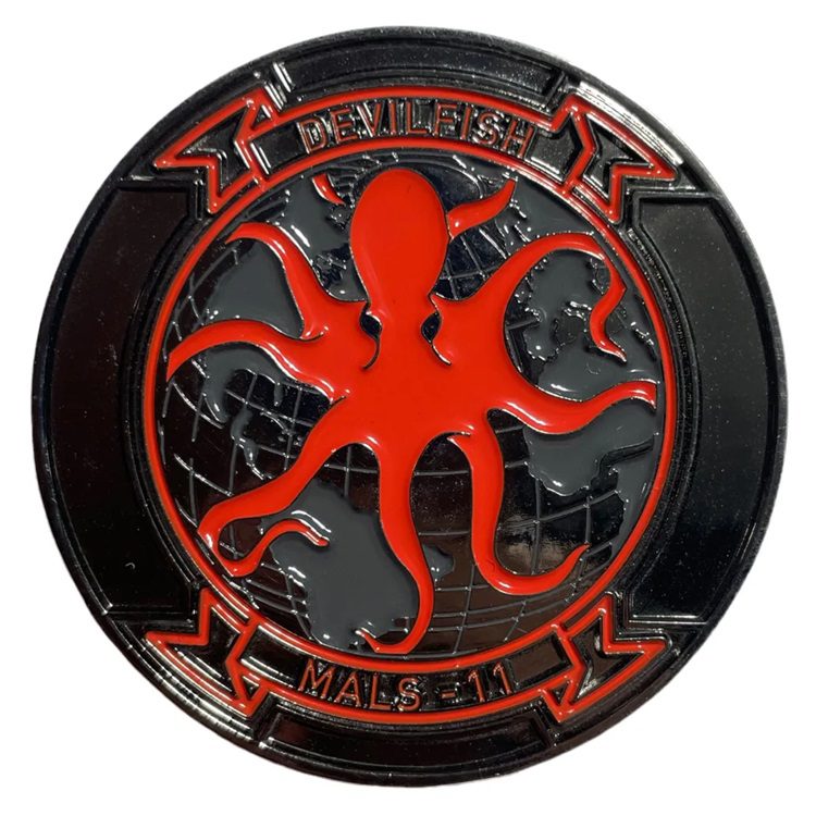 a MALS-11 Devilfish black US Marine Corps challenge coin with a red octopus