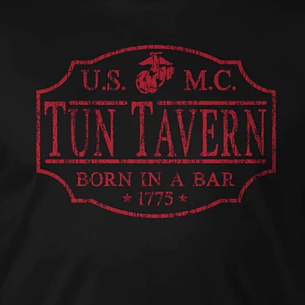 closeup of the front of a red and black US Marine Corps shirt that says "Tun Tavern" and "Born in a Bar"