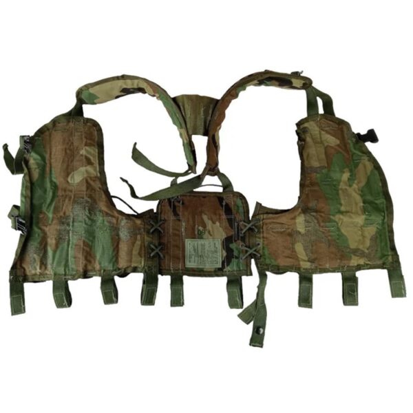 the inside of a woodland camouflage grenade carrier vest