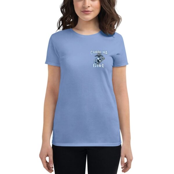 a woman wearing a sky blue shirt that says "Carolina Girl" with a Marine Corps EGA