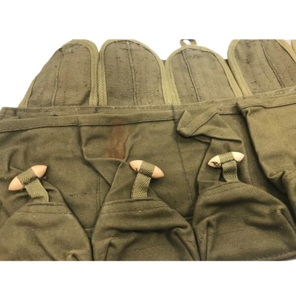 an olive drab 10 Pocket Chinese SKS chest rig close up with fasteners