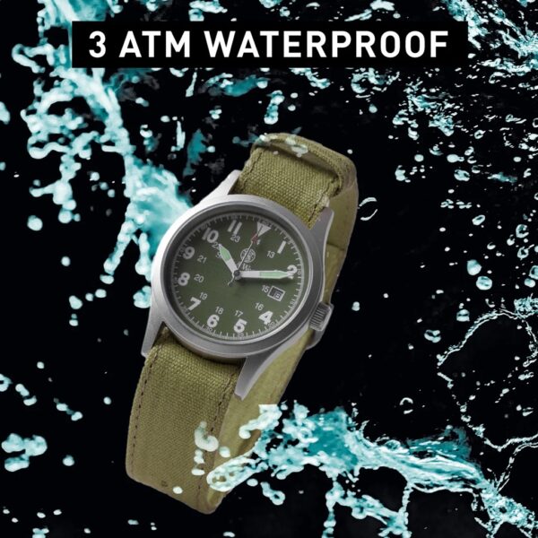 an olive drab watch with water around it; at the top of the image is "3 ATM Waterproof"