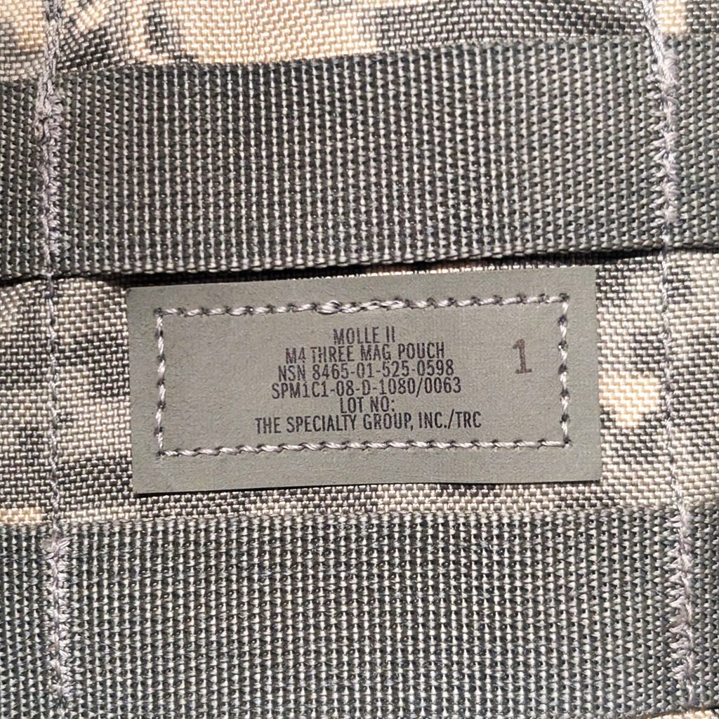 a US Army UCP camouflage triple magazine pouch