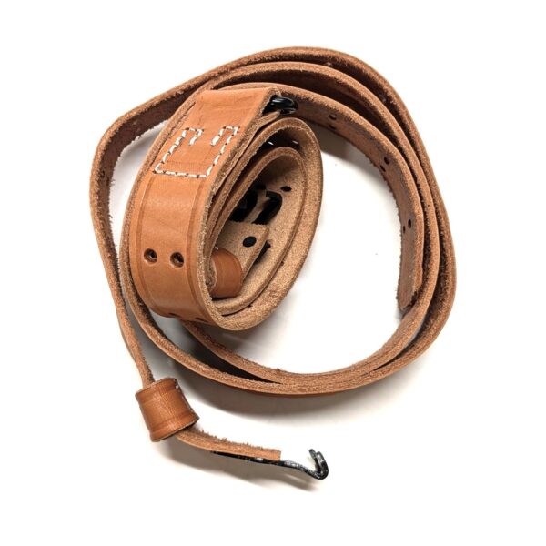 a brown leather rifle sling