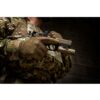a soldier in OCP Scorpion II camo holds a pistol while wearing Mechanix Original coyote gloves