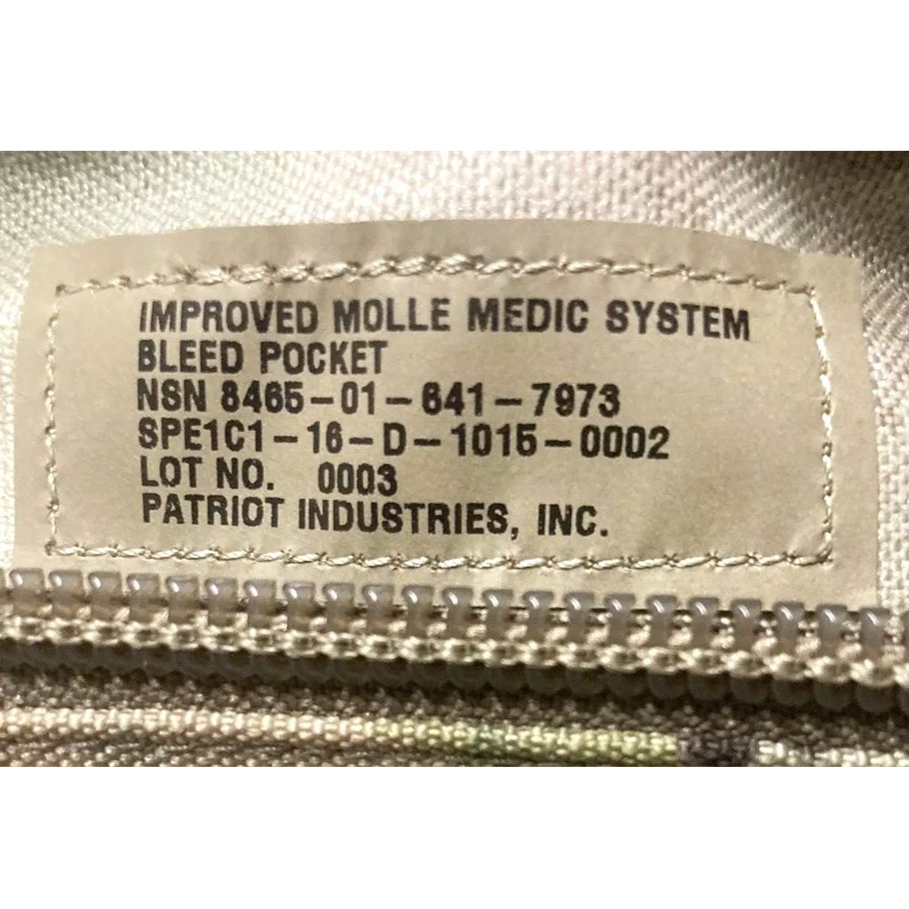 a USGI OCP Scorpion bleed quick release medical pouch