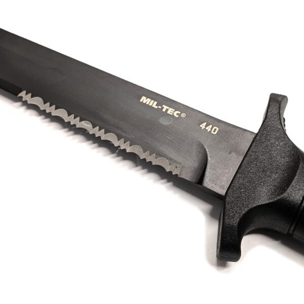 a Mil-Tec KM2000 combat utility knife's serrated blade
