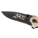 a US Marine Corps 250th anniversary commemorative pocket knife in desert MARPAT with a black blade