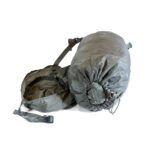 a foliage green US Army small compression stuff sack, part of the Improved Modular Sleep System (IMSS)