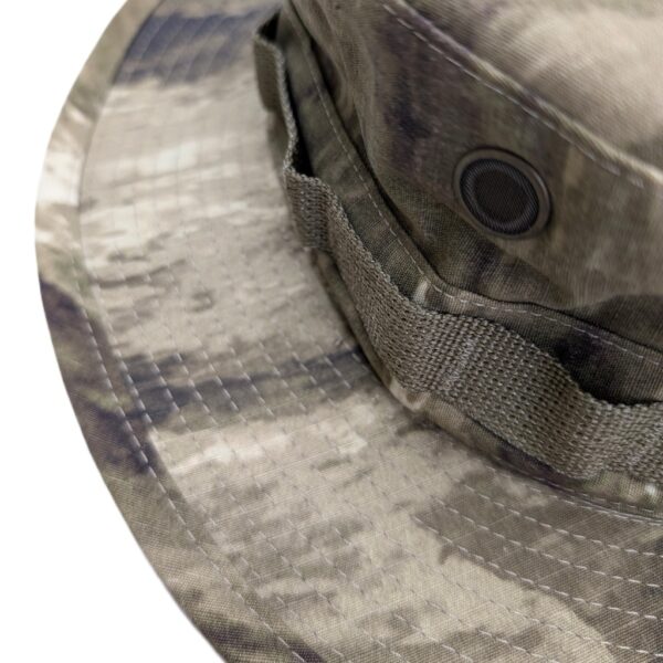 an A-TAC AUX (arid urban) camouflage USGI boonie cover (jungle hat)