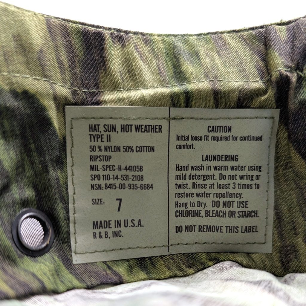 a foliage green woodland camo A-TACS FGX USGI boonie cover