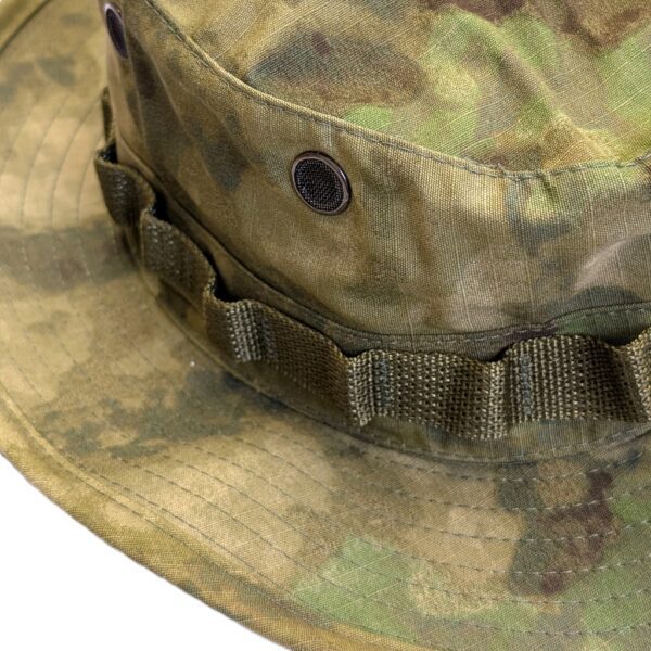 a foliage green woodland camo A-TACS USGI boonie cover