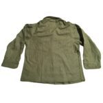 an olive drab, Korean War-era OG-108 M1951 cold weather field shirt