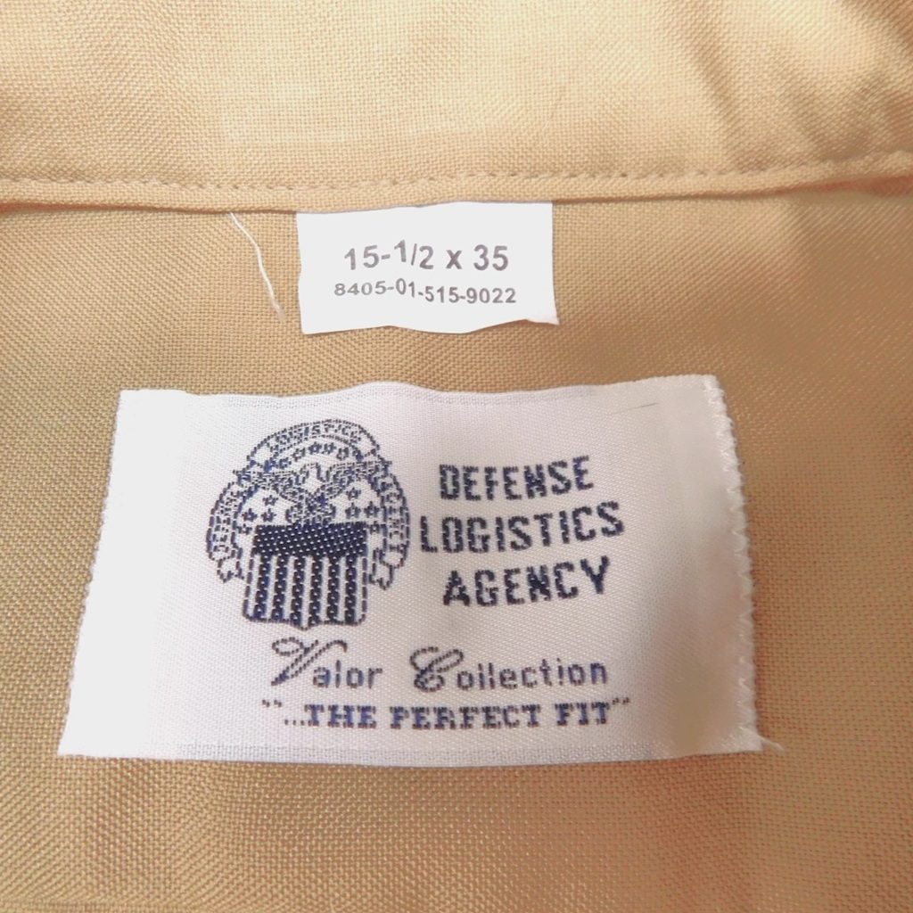 a US Marine Corps M-1 khaki long sleeve men's service uniform dress shirt