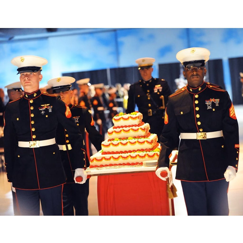 US Marines carry a cake at the US Marine Corps Ball on November 10