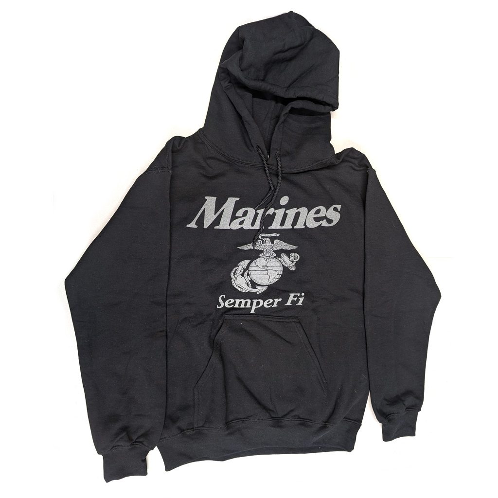 a black Marine Corps hoodie with reflective print: "Marines" "Semper Fi" and an Eagle, Globe, & Anchor